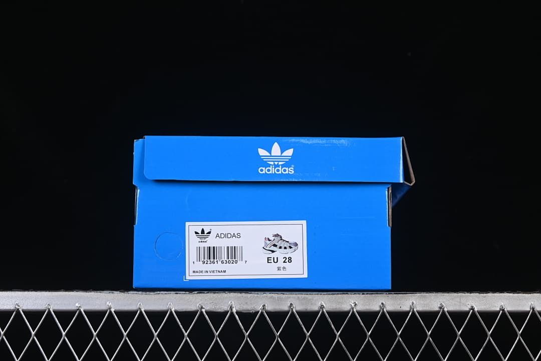 Blue adidas box with a label showing EU 28
