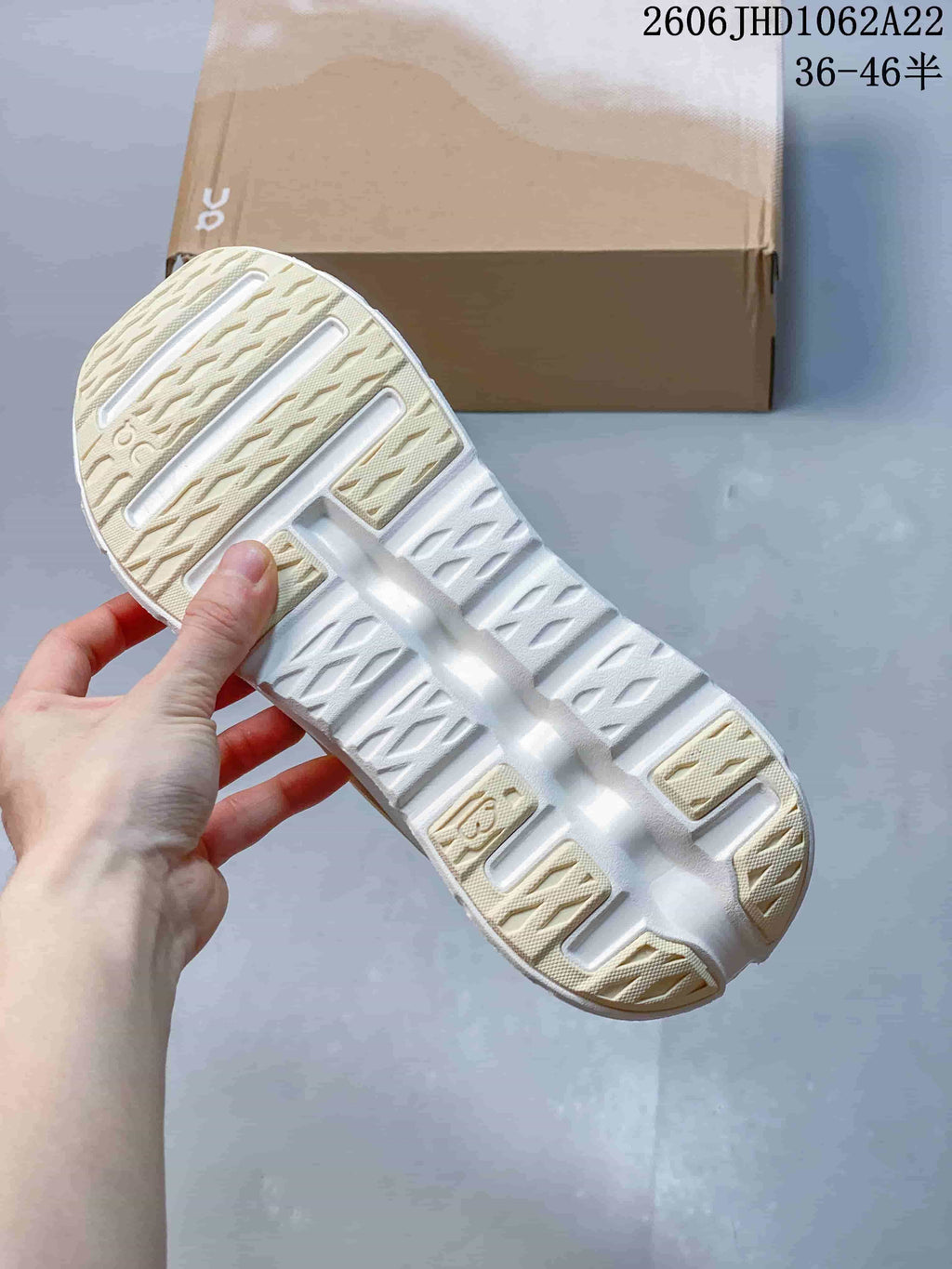 Close-up of the patterned outsole on an On Cloudtilt Remix sneaker.