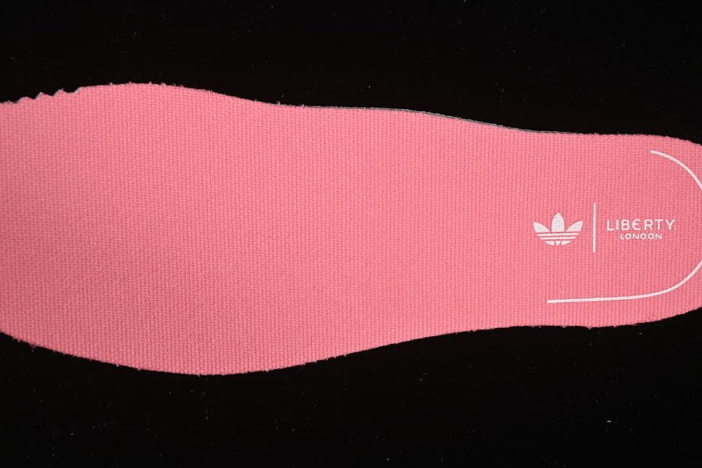Pink insole with adidas and Liberty London branding