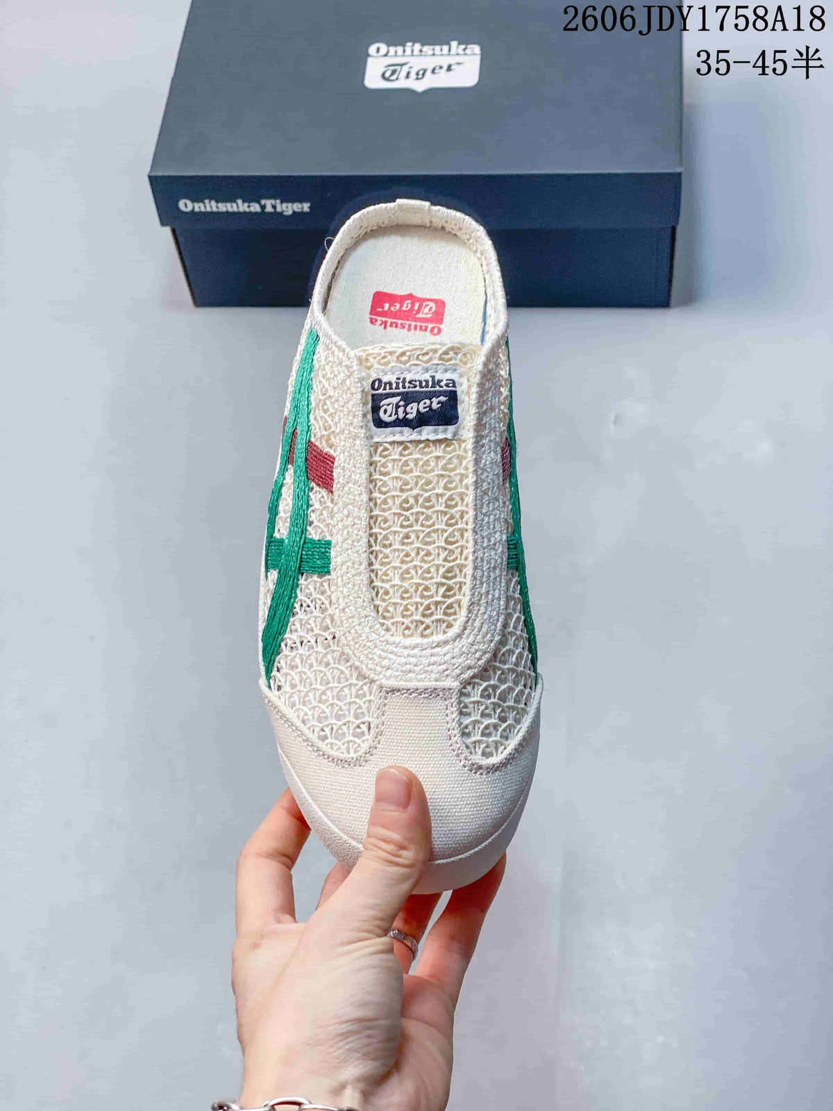 Top view of the patterned upper and slip-on opening on a cream Onitsuka Tiger Sabot