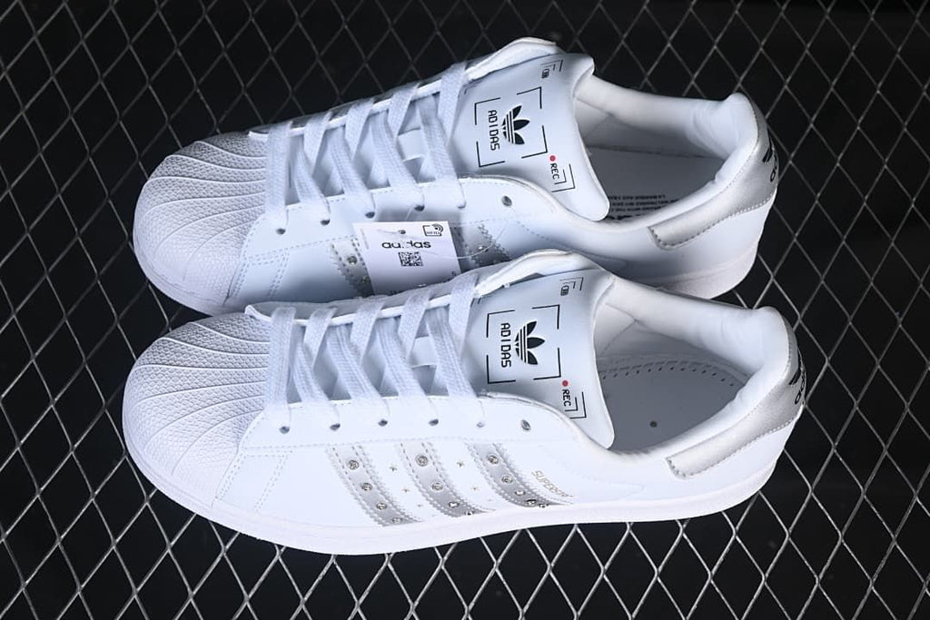 Pair of white Superstar II sneakers with silver details