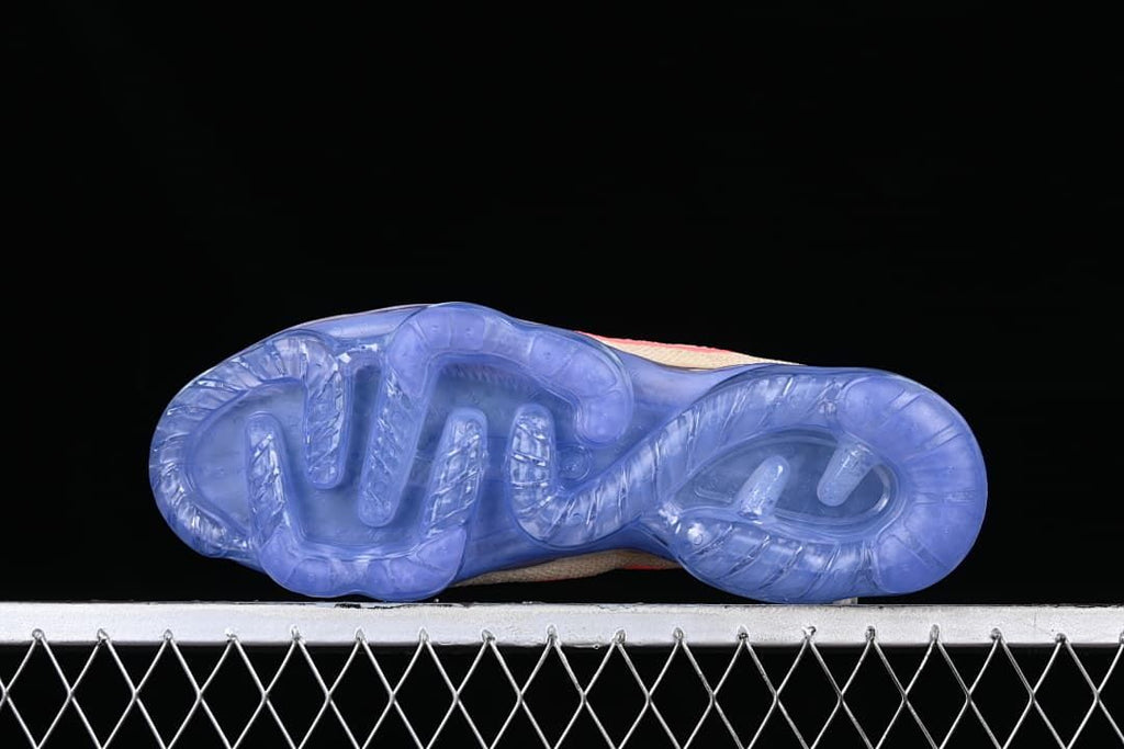 Underside view showing the translucent blue outsole.