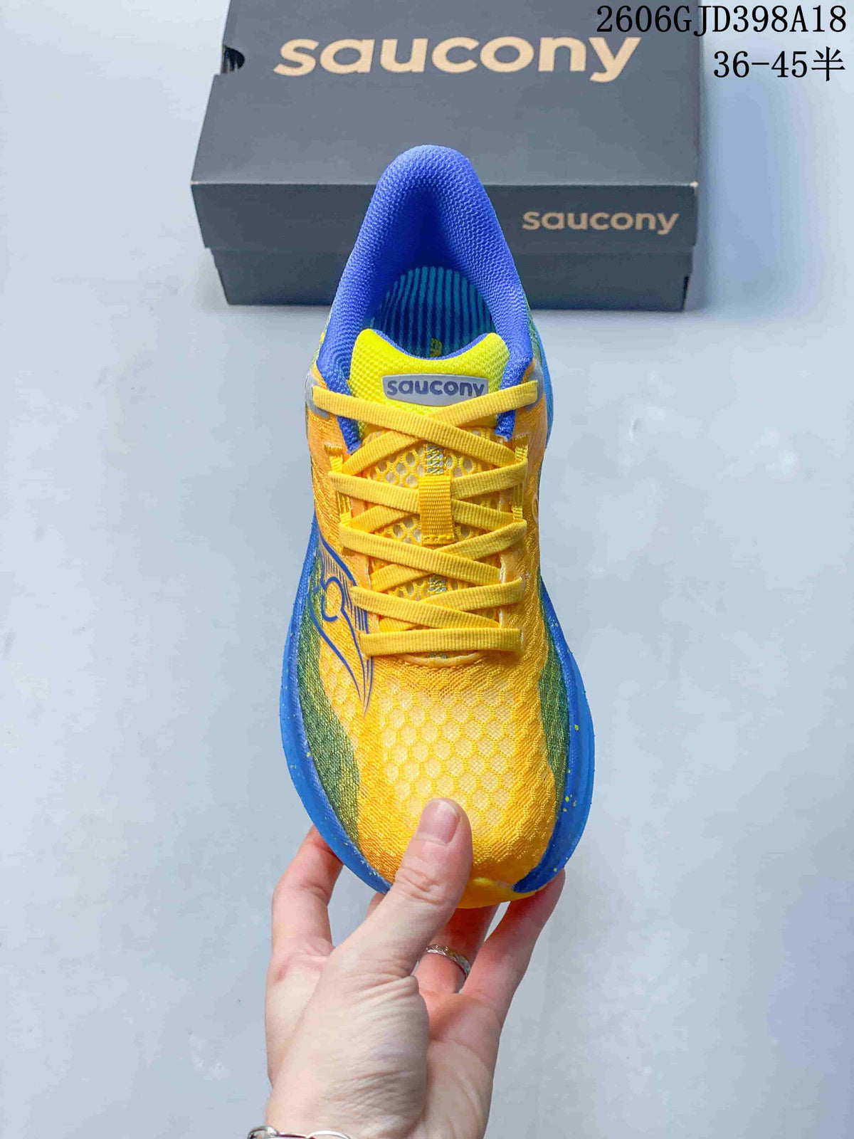 Top view of the shoe showing the yellow laces and patterned upper