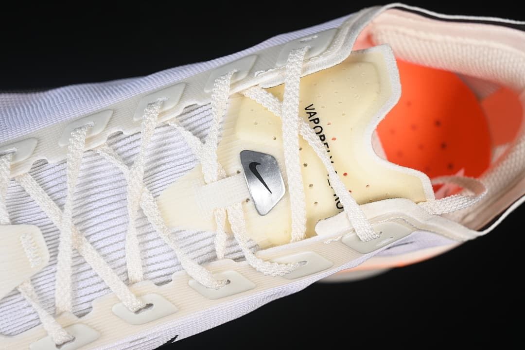 Top-down close-up of the lacing system and tongue