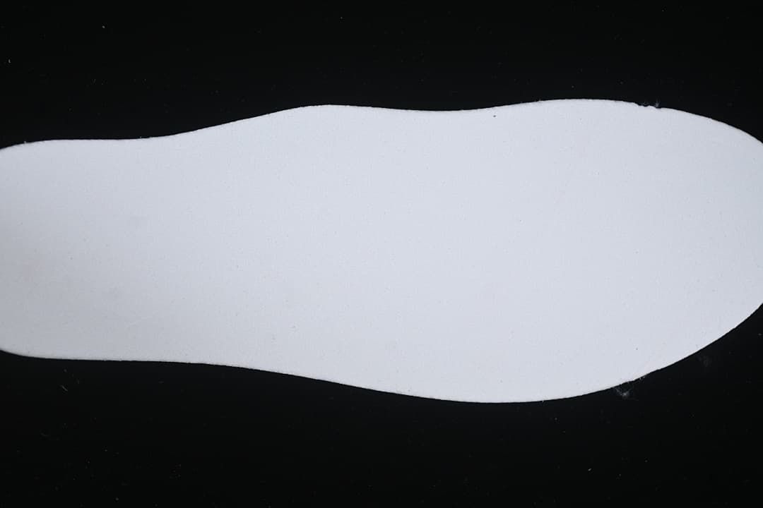 White shoe insole shown from above