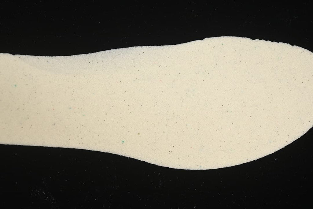 Close-up of a light-colored shoe insole.