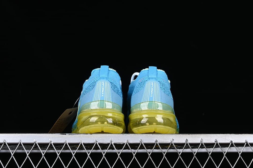 Rear view of the pair showing heel details and translucent yellow soles.