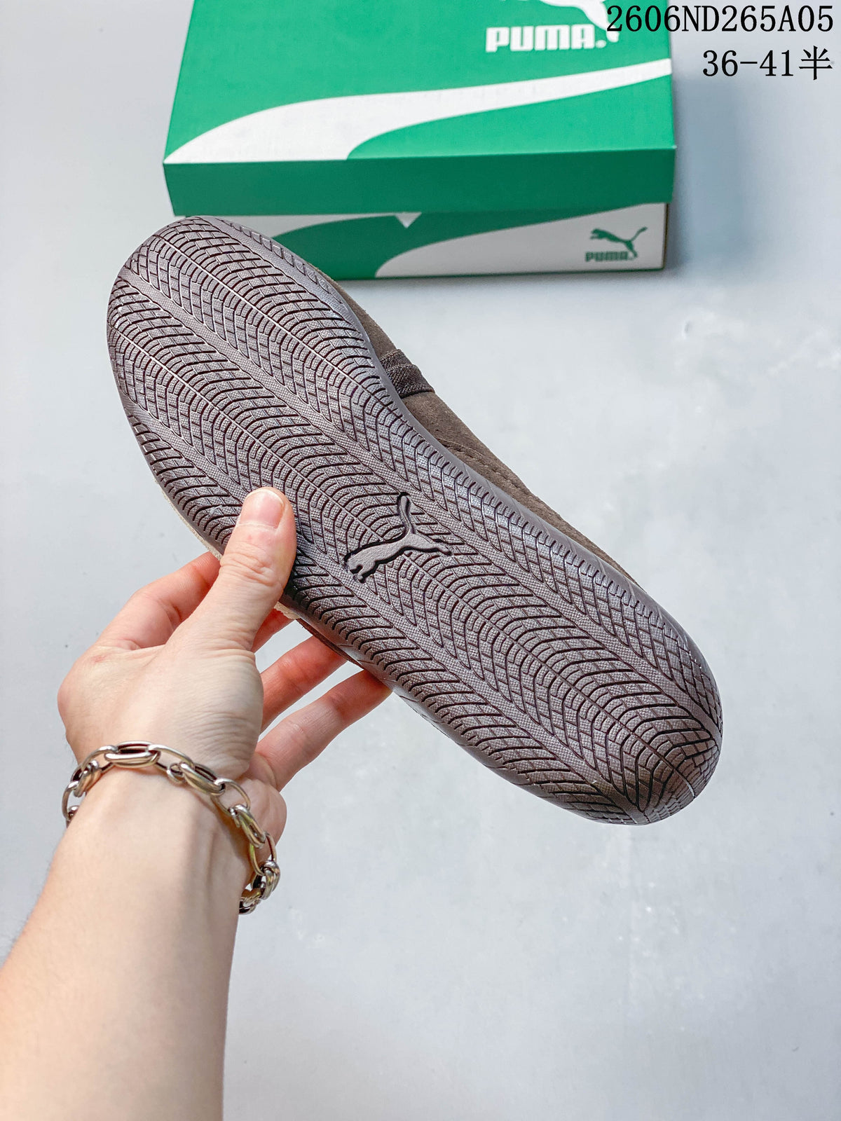 Underside of a brown PUMA Speedcat Ballet shoe showing the patterned outsole
