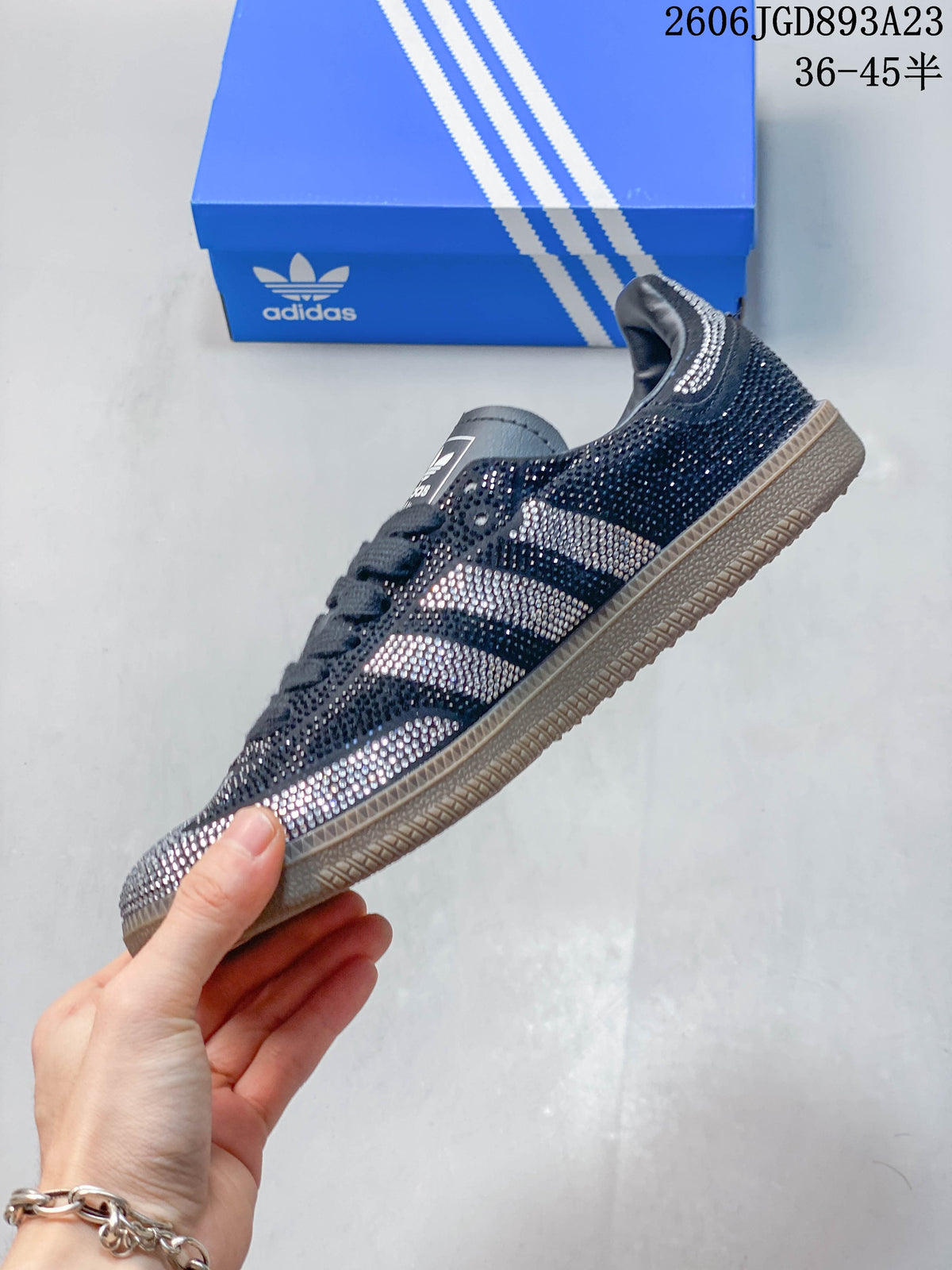 Side profile showing the three stripes and decorative upper