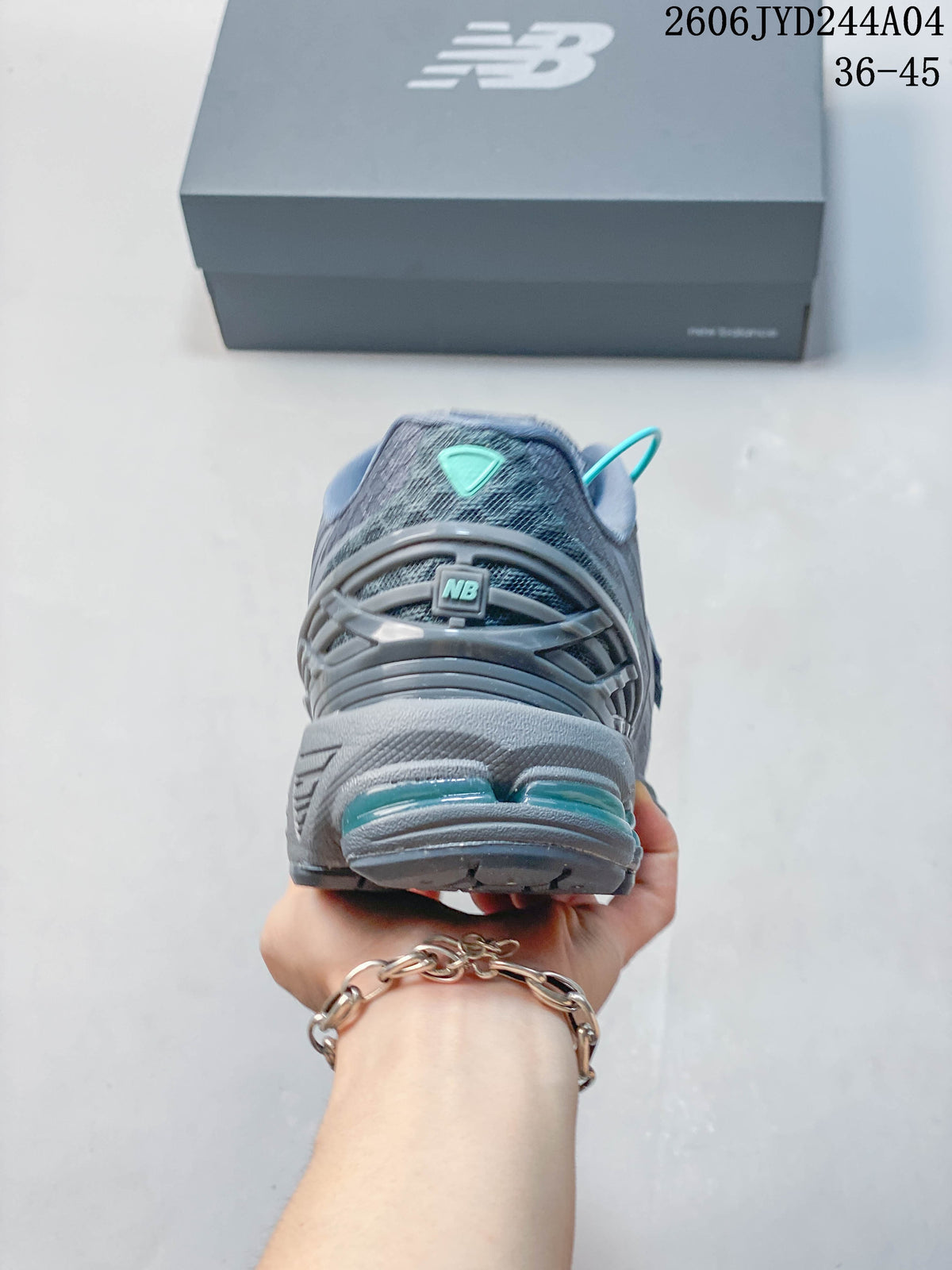 Rear view of a gray sneaker with teal-colored heel accents
