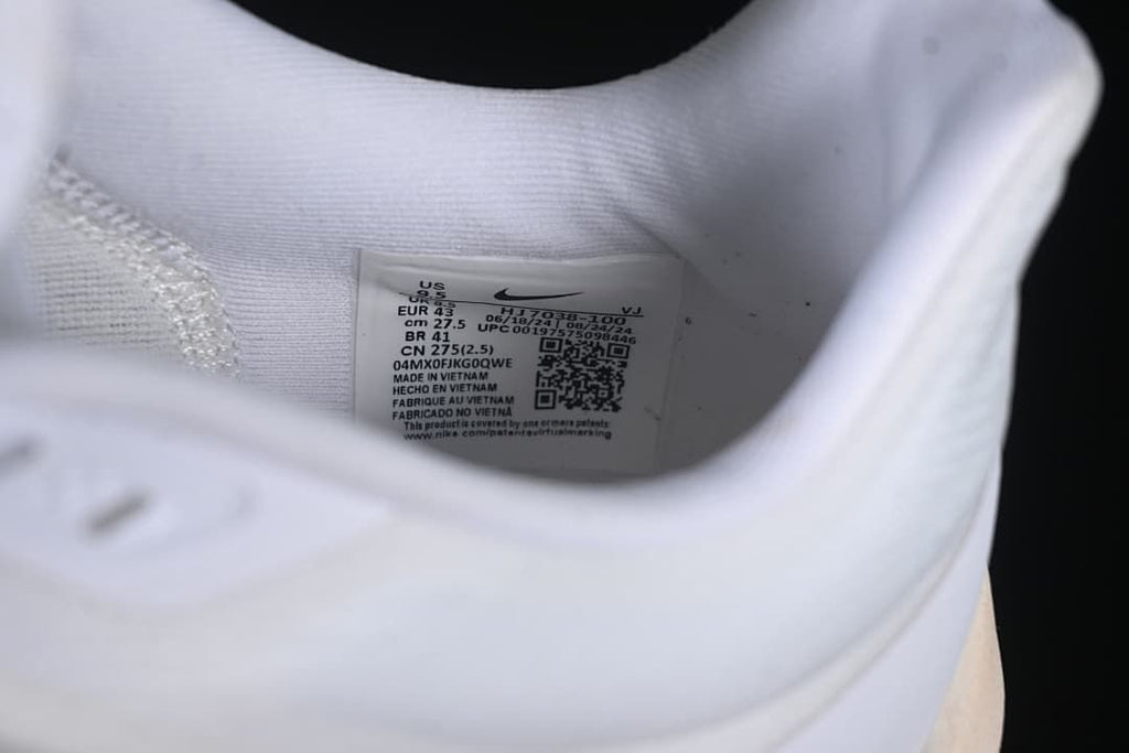 Shoe interior label showing the sample size and style code HJ7038-100