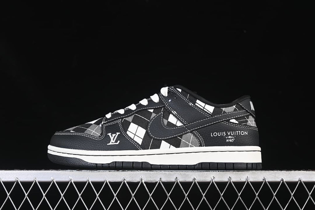 Side view of a black-and-white grid-pattern low-top sneaker with white stitching and logo-style details.