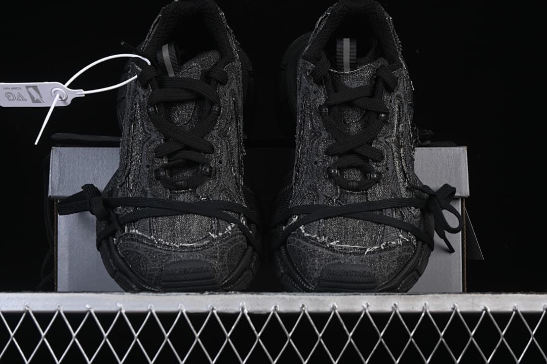Front view of the pair highlighting the layered toe panels and laces.