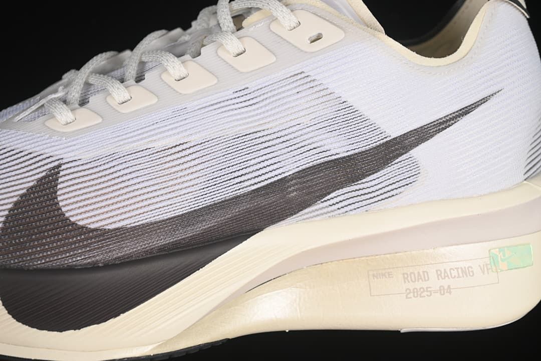Close-up side view of the upper, Swoosh and midsole markings
