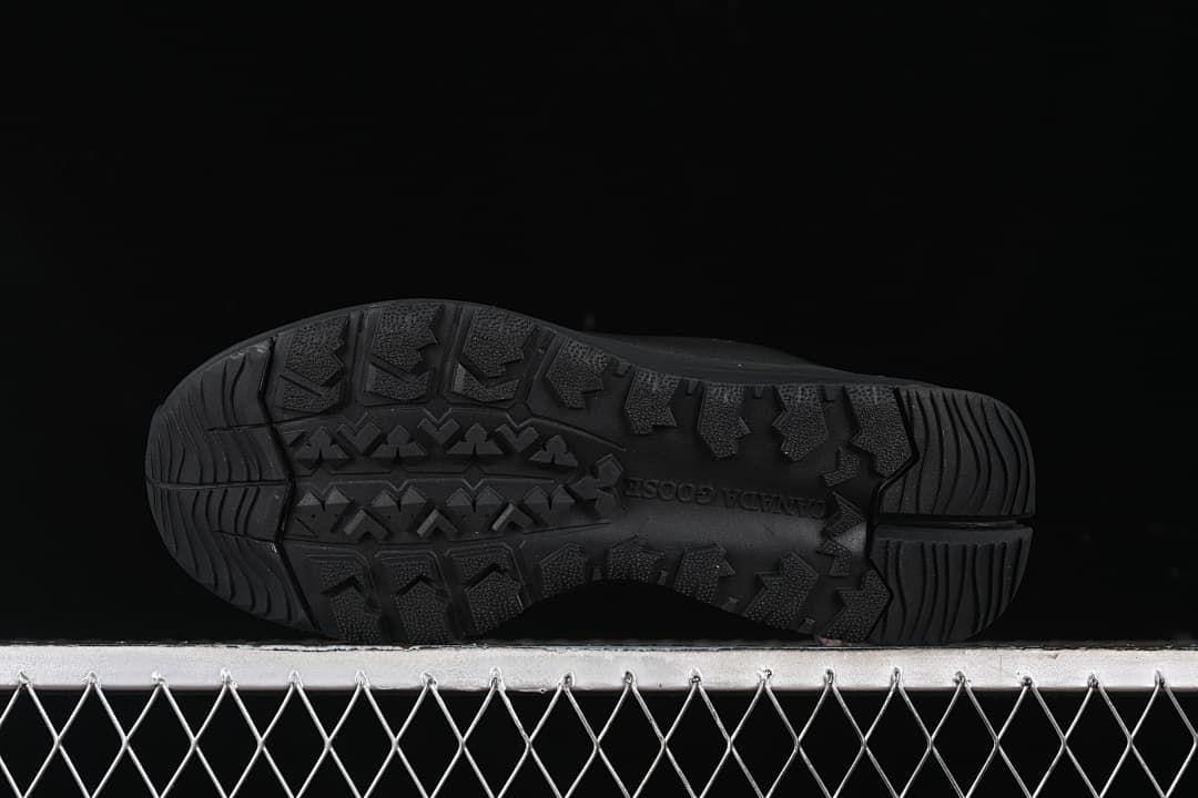 Underside of the sneaker showing its patterned black outsole