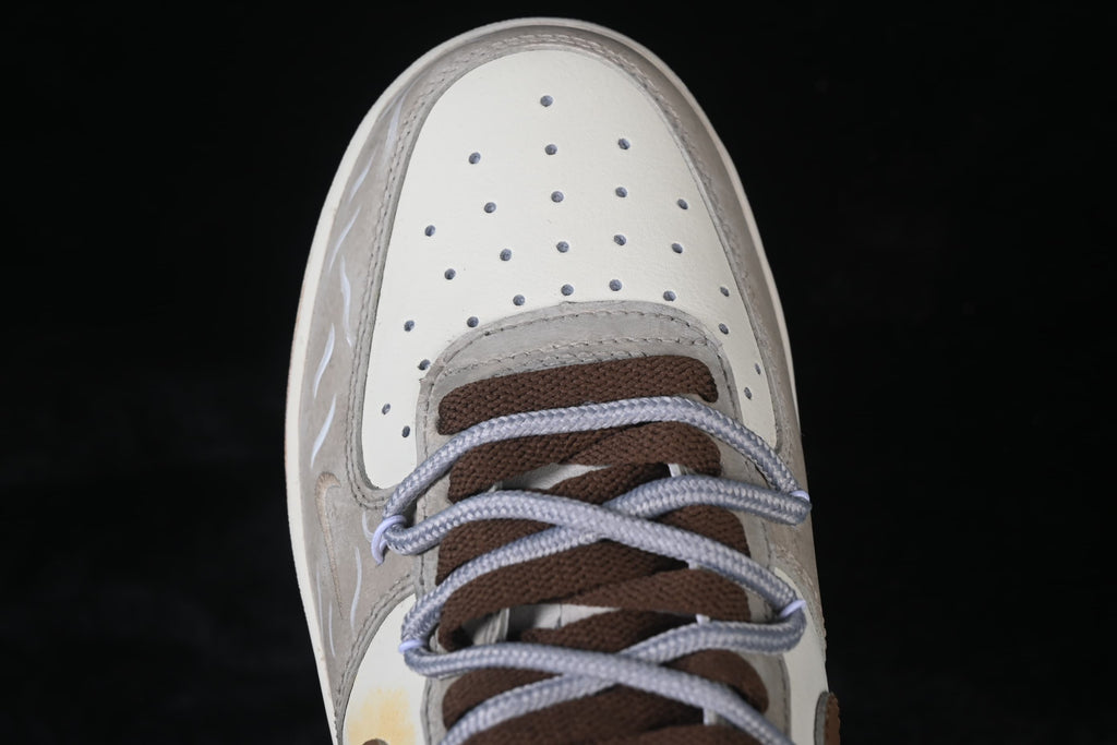 Top close-up of perforated toe and layered laces