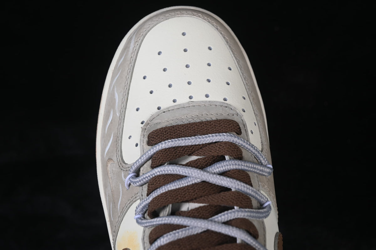 Top close-up of perforated toe and layered laces