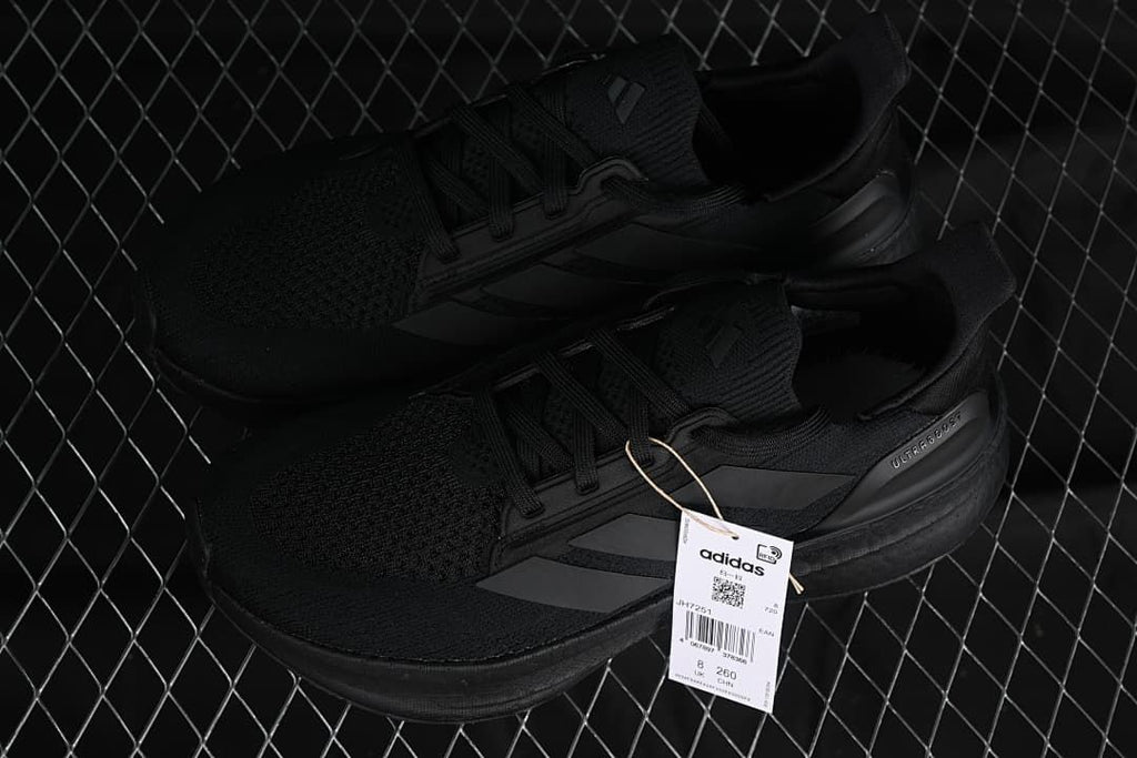 Pair of black Ultraboost 5X shoes with product tag