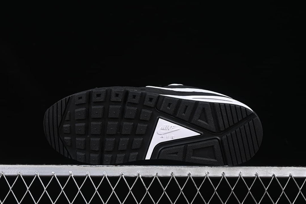 Underside view showing the black tread pattern