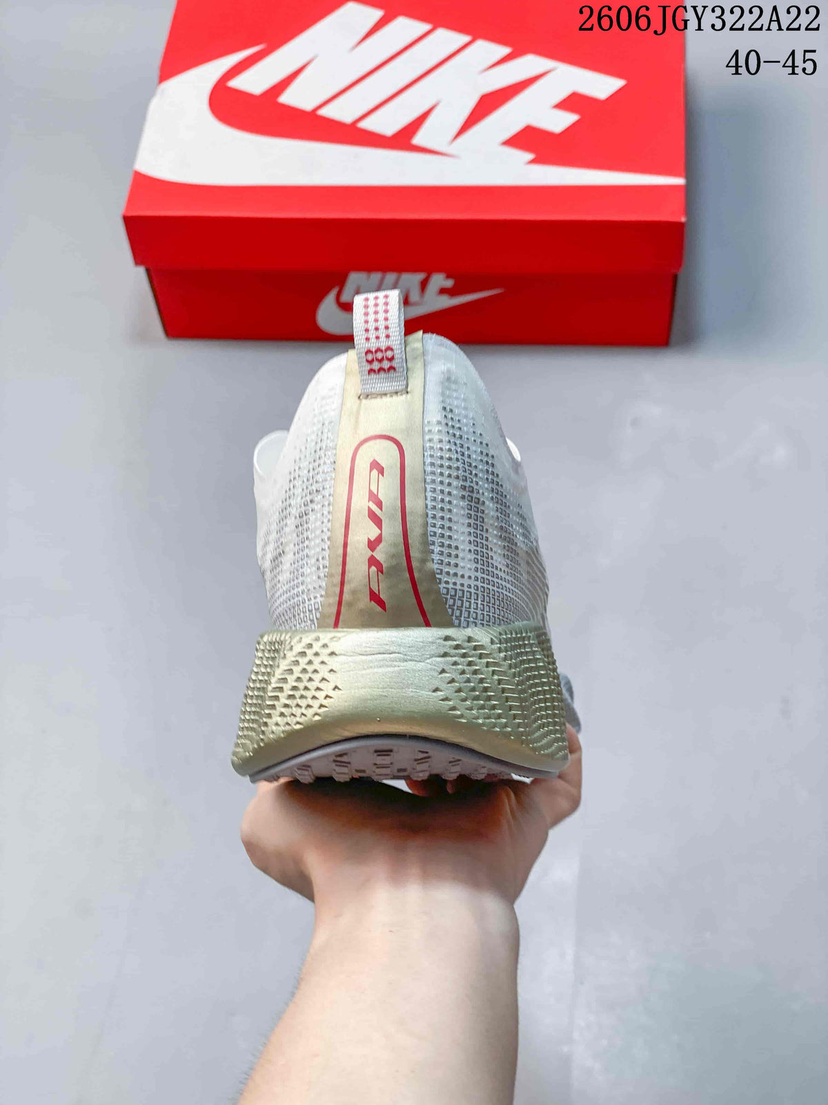 Rear view of the Nike Ava X sneaker showing its heel structure.