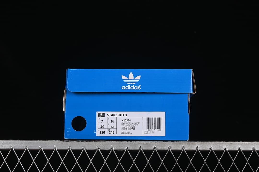 Blue adidas shoebox with a Stan Smith M20324 size label showing 40
