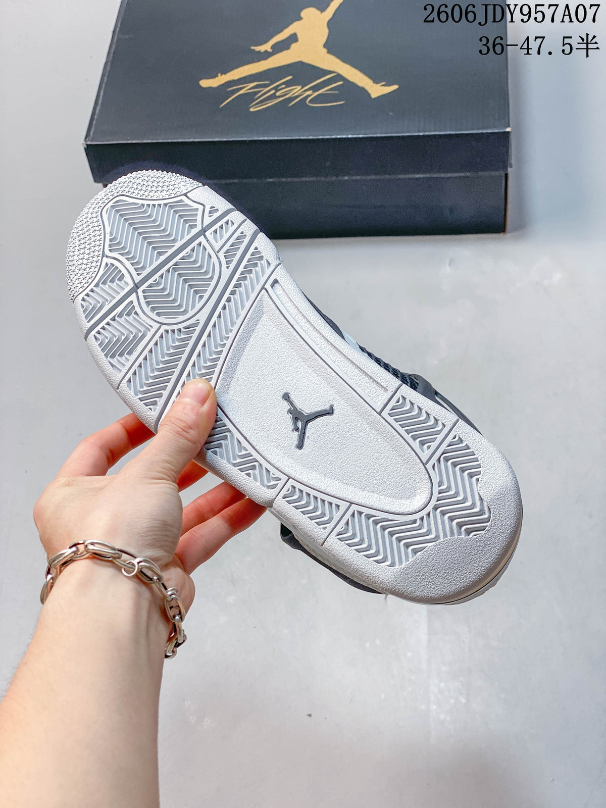 Outsole view of a Jordan 4 sneaker with patterned tread