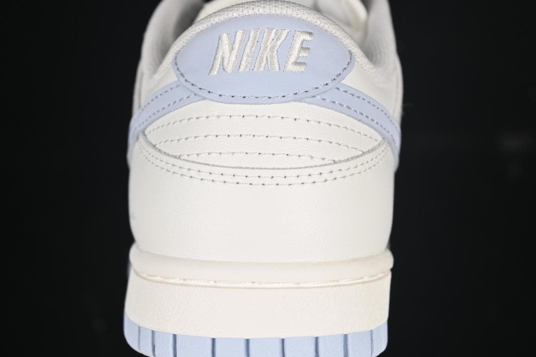 Rear view of the sneaker with light blue heel details
