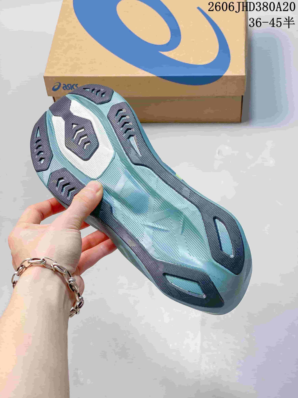 Outsole view of the blue ASICS Novablast 6 running shoe