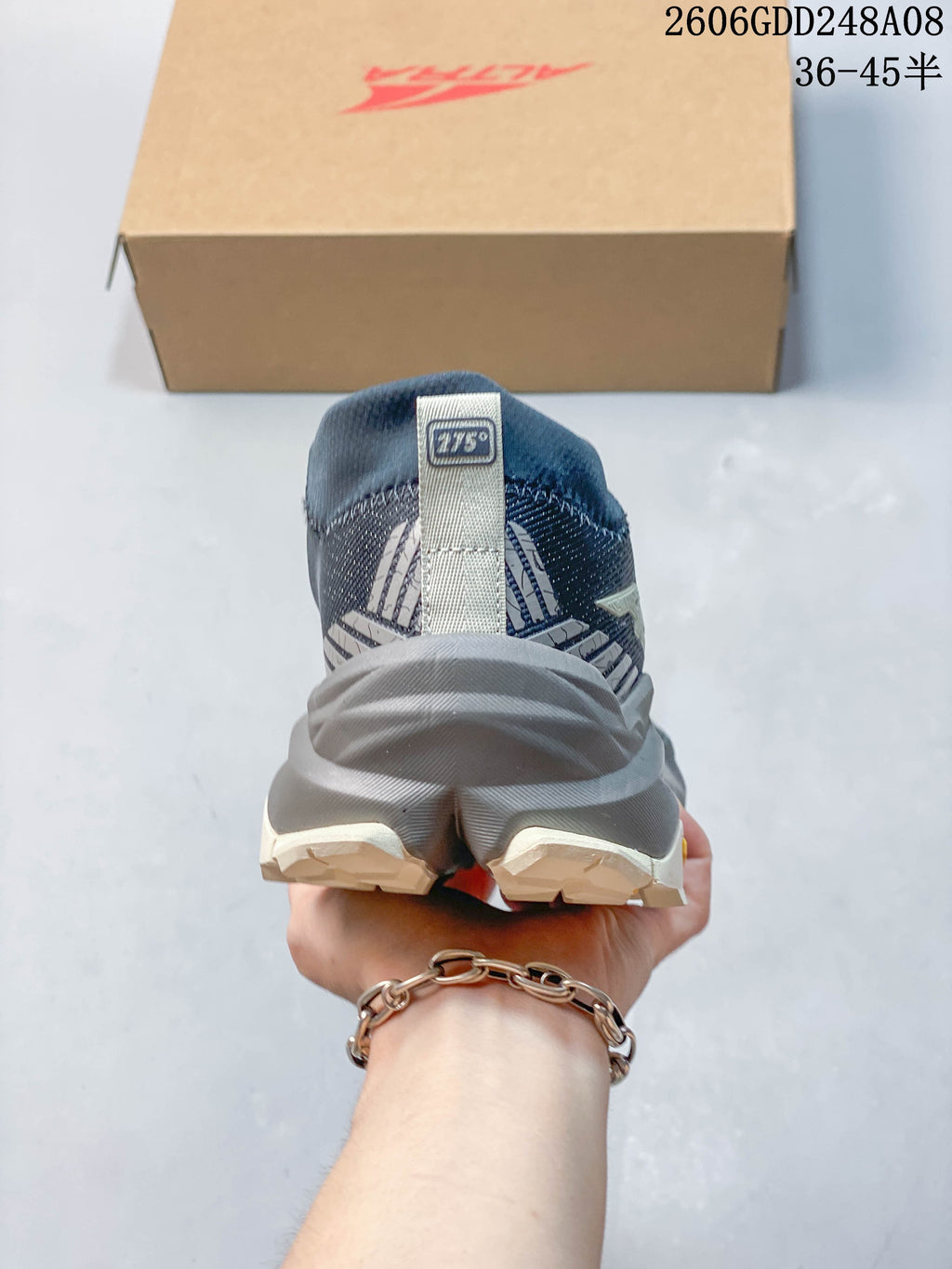 Rear view of an Altra Olympus 275 shoe showing the heel and midsole