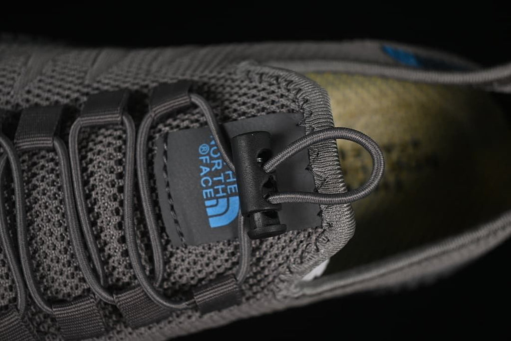 Close-up of the toggle closure and cord laces