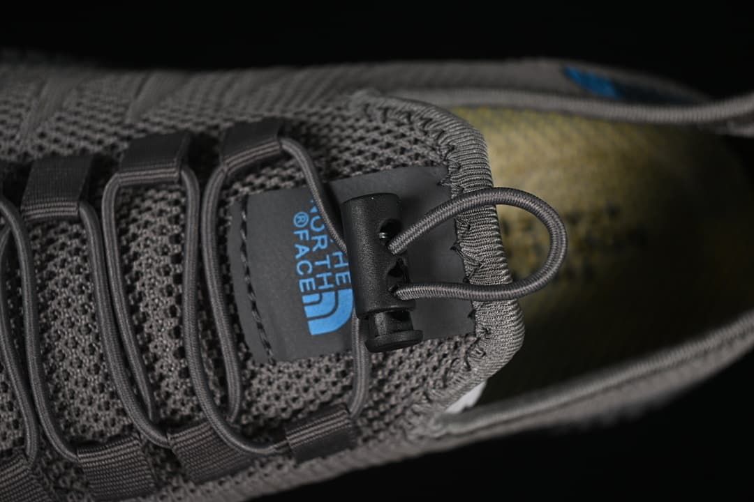 Close-up of the toggle closure and cord laces