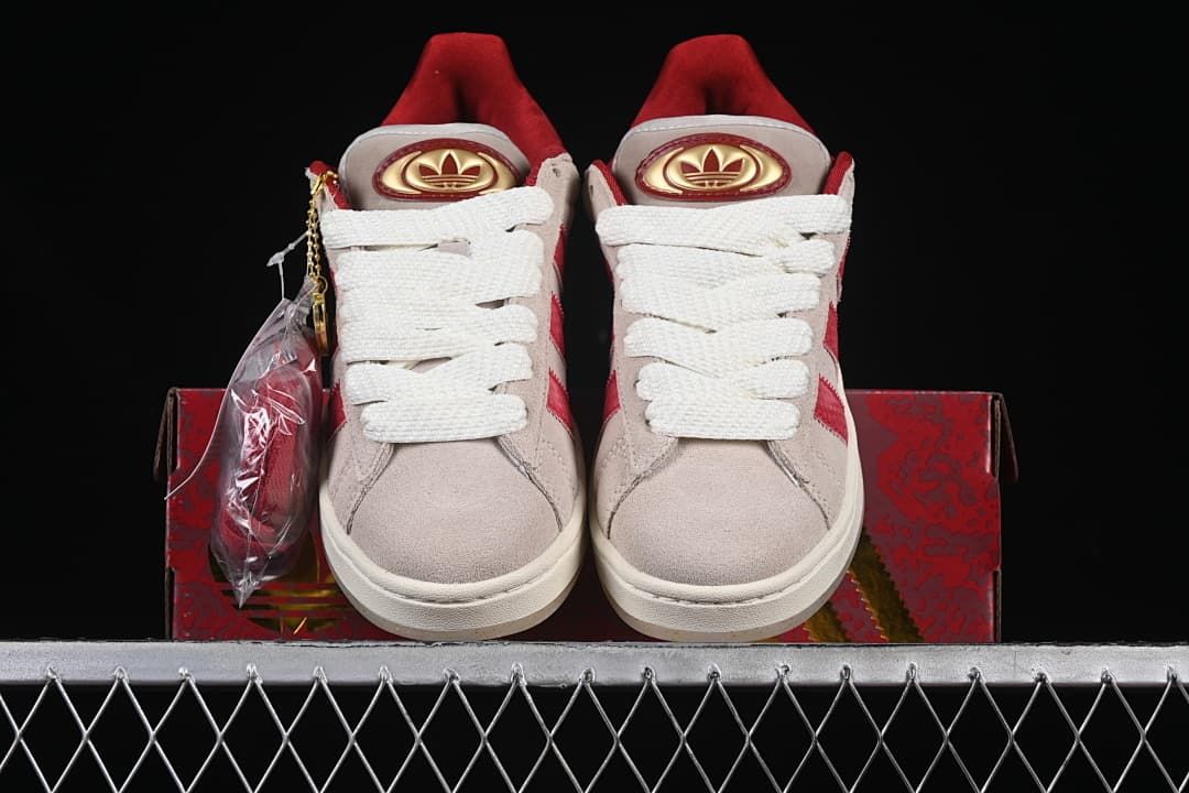 Front view of the pair with white laces and red accents