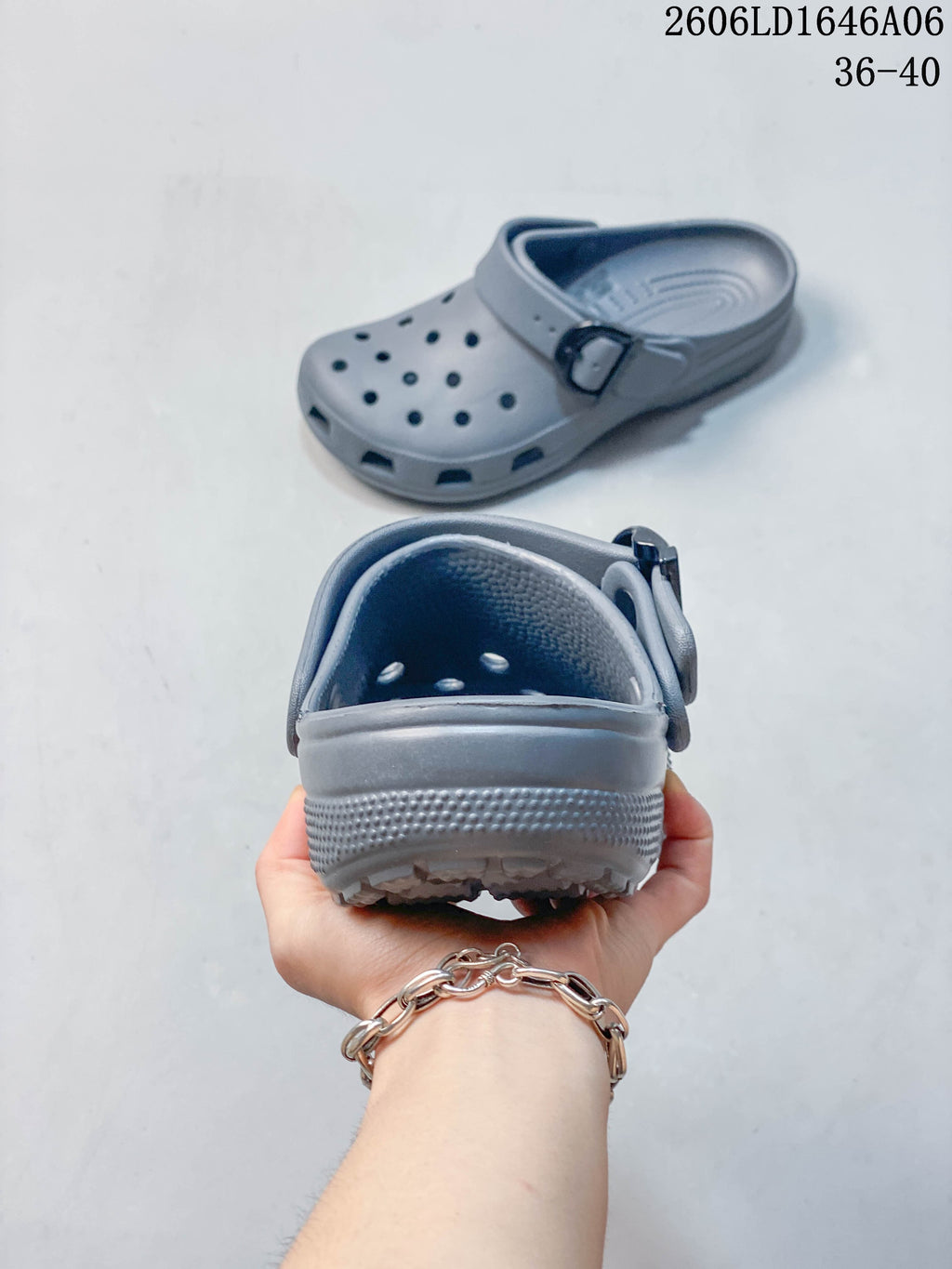 Rear view of a gray clog highlighting the heel cup, textured footbed and adjustable strap; image also displays size range 36–40.