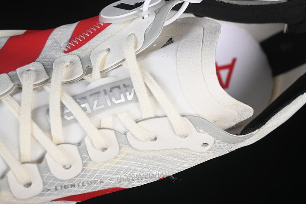 Close-up of the lace area and textured white upper