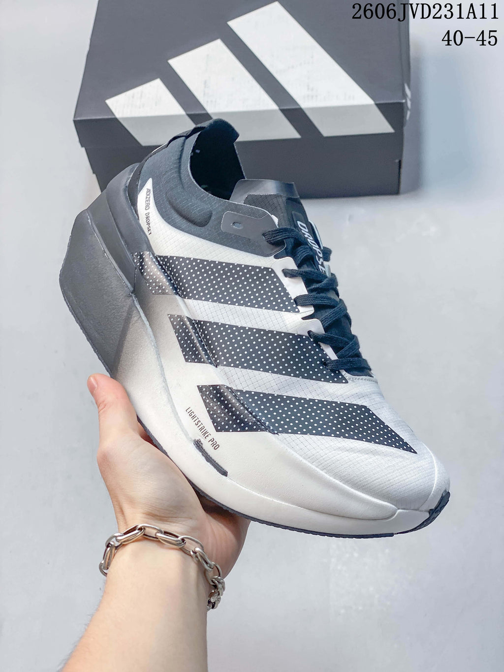 Angled side view showing the three-stripe detail and LIGHTSTRIKE PRO marking