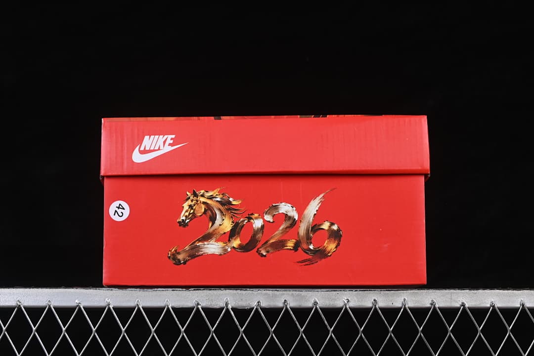 Red Nike shoe box with a visible size sticker marked 42
