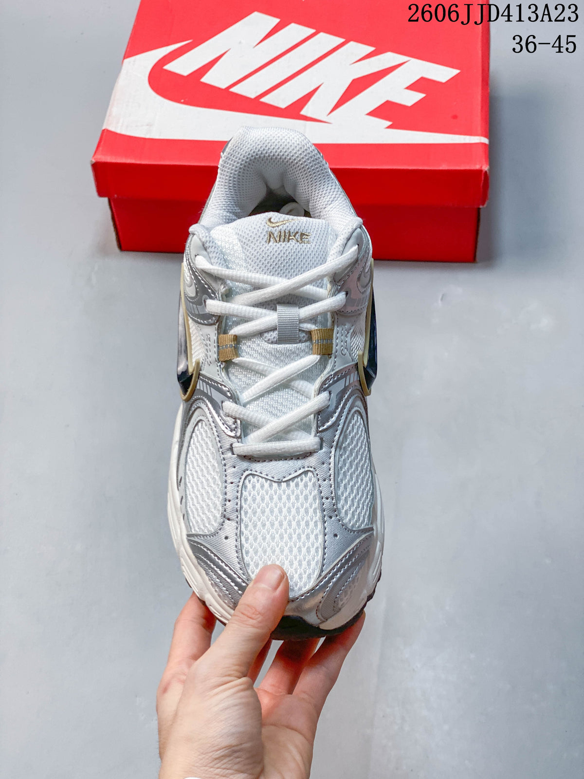 Top view of the shoe showing the mesh panels, tongue and laces