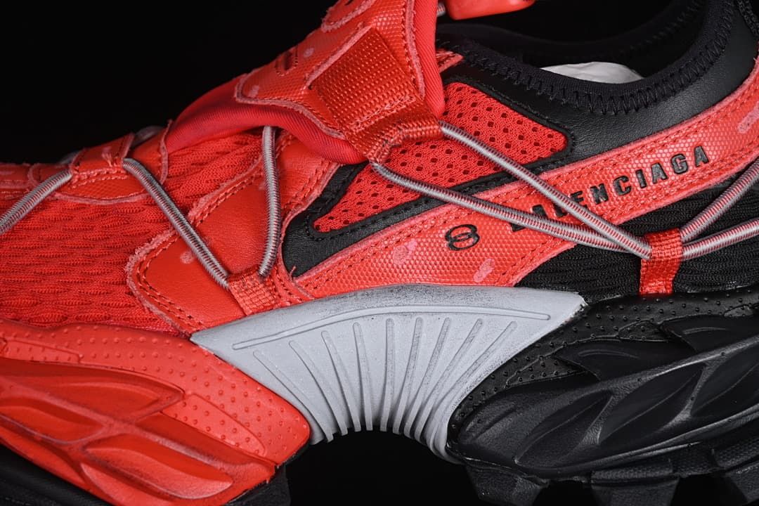Close-up of the side panels, cord overlays, and gray midfoot detail