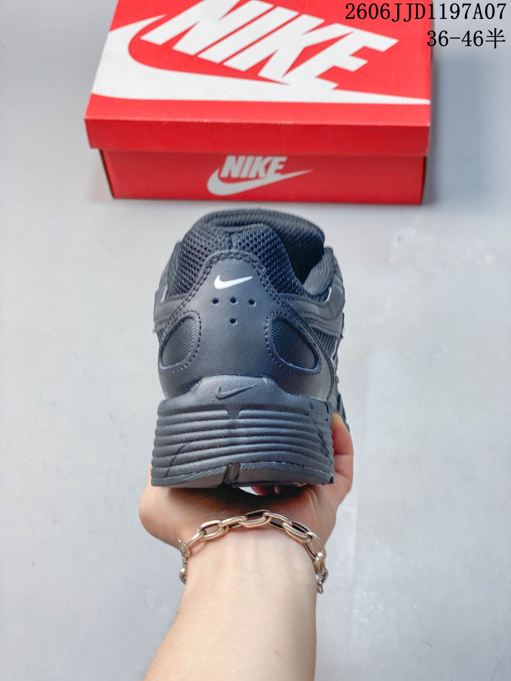 Rear view of the dark gray sneaker