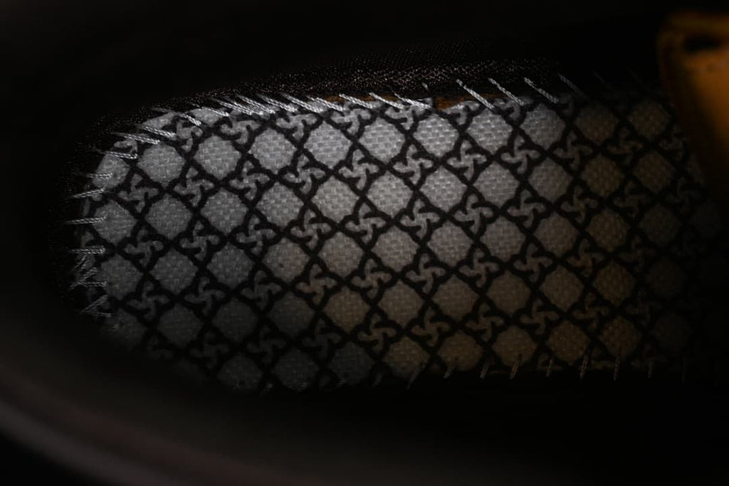 Close-up of patterned fabric inside the boot