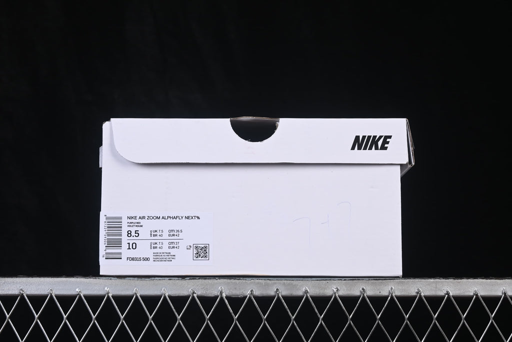 Nike shoe box label showing product name, purple color description, style code FD8315-500, and size details.