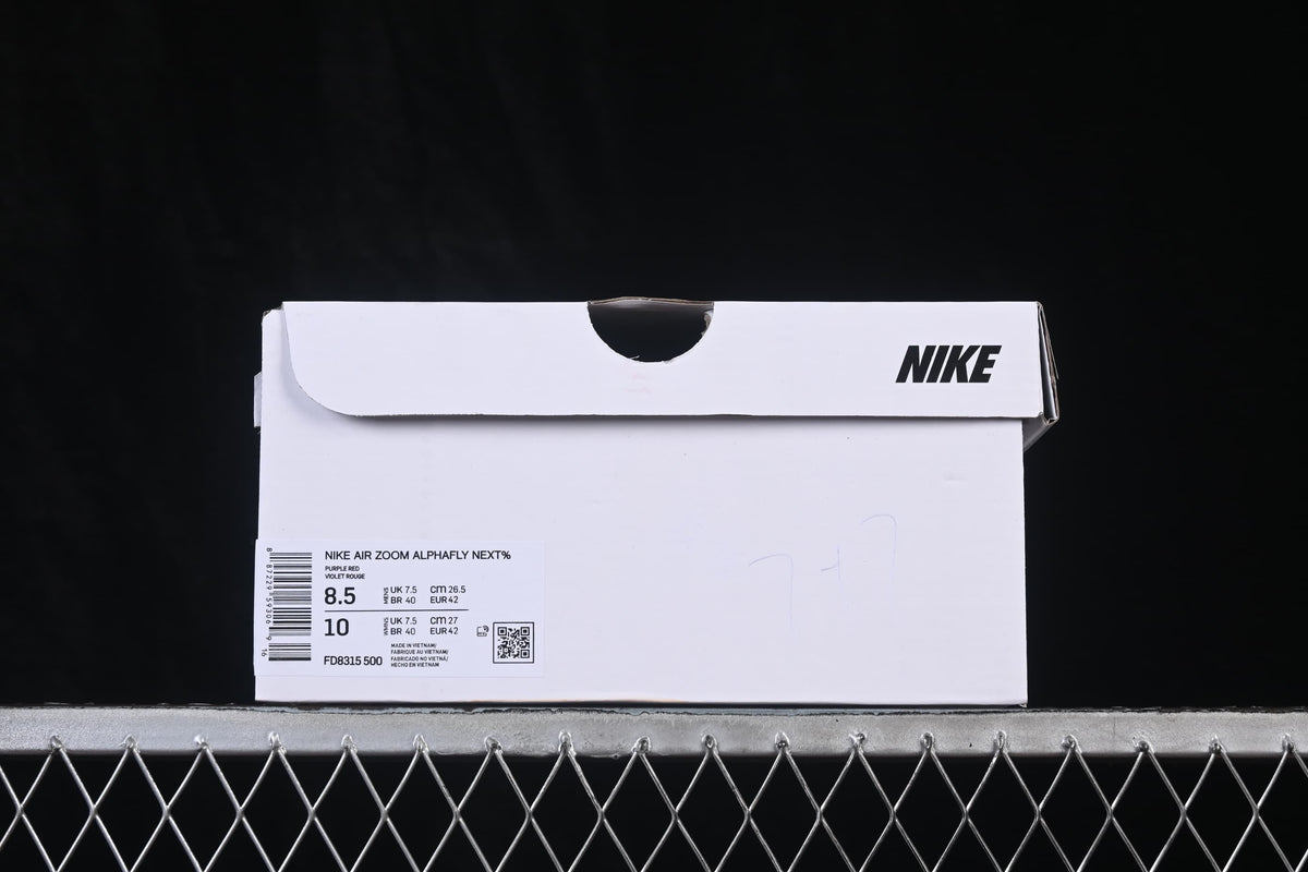 Nike shoe box label showing product name, purple color description, style code FD8315-500, and size details.