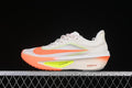 Side view of an off-white Nike Zoom Fly 6 with orange and neon yellow-green accents.