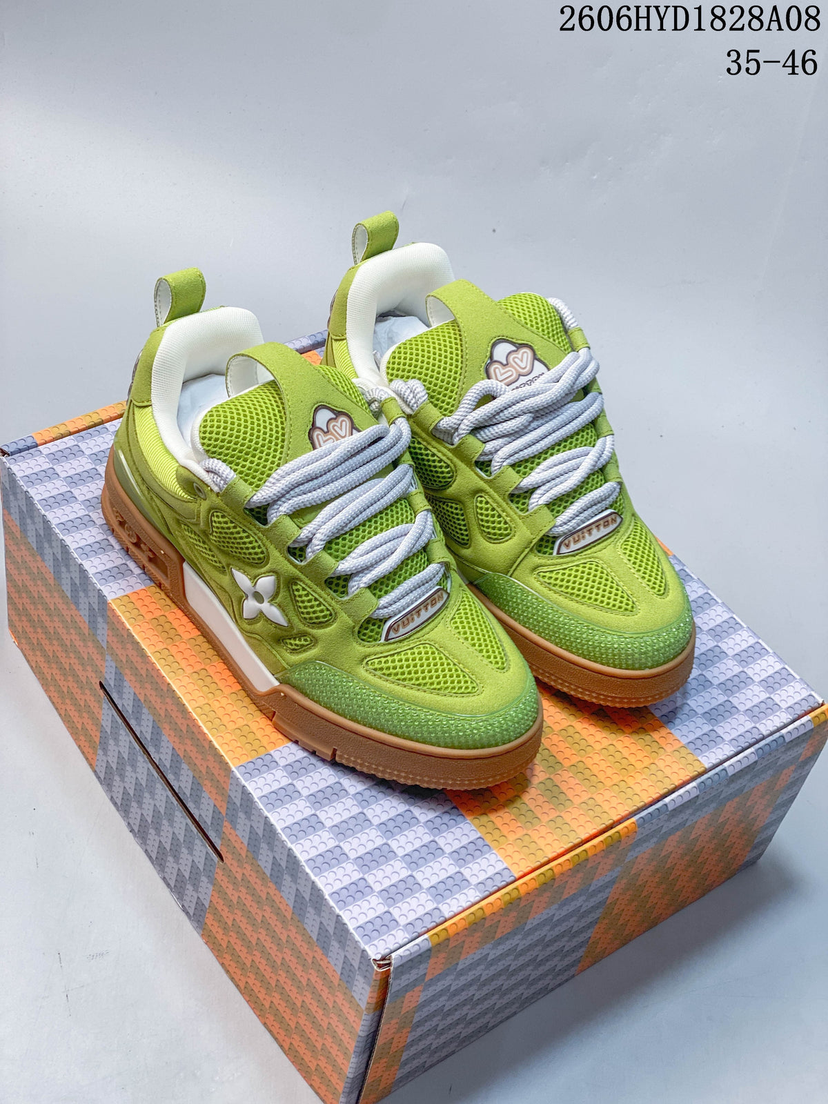 Four Louis Vuitton Trainer-style sneakers shown in brown, orange, purple, and lime green; the image also displays a size range of 35–46.