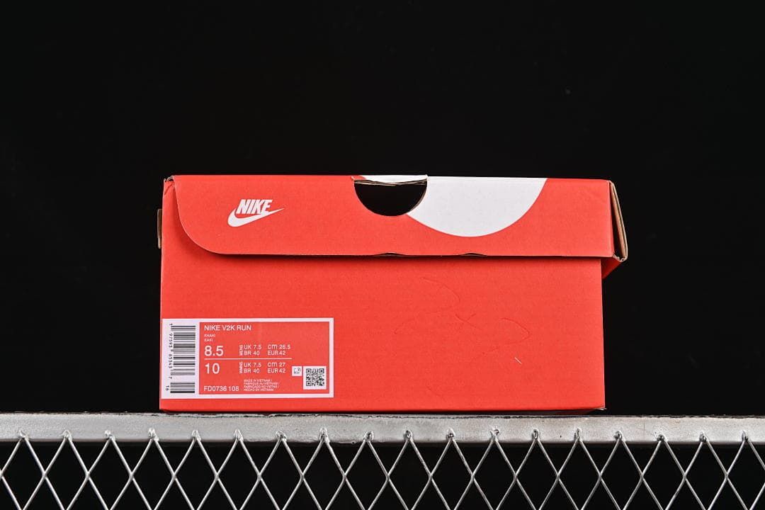 Nike shoe box label showing V2K Run name, style code, and sample sizing
