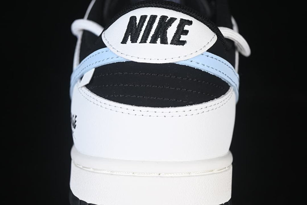 Rear view of the sneaker showing heel panel and light blue accent