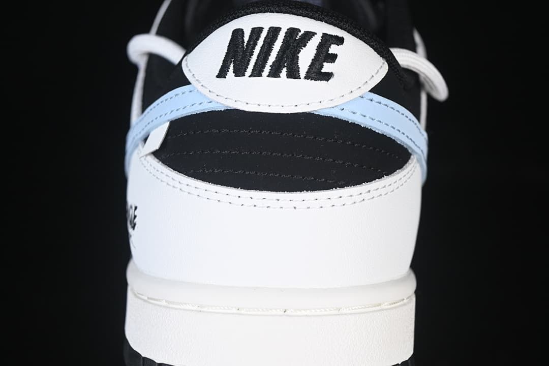 Rear view of the sneaker showing heel panel and light blue accent