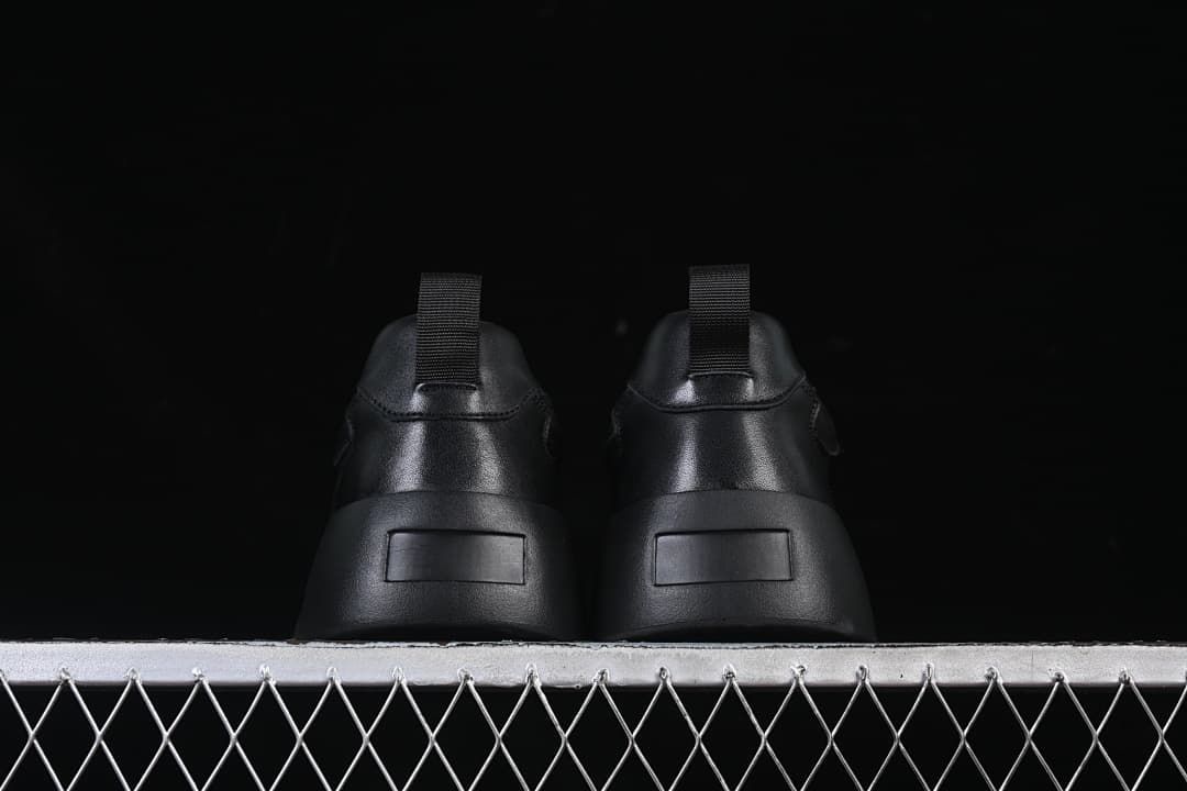 Rear view of both sneakers with heel pull tabs
