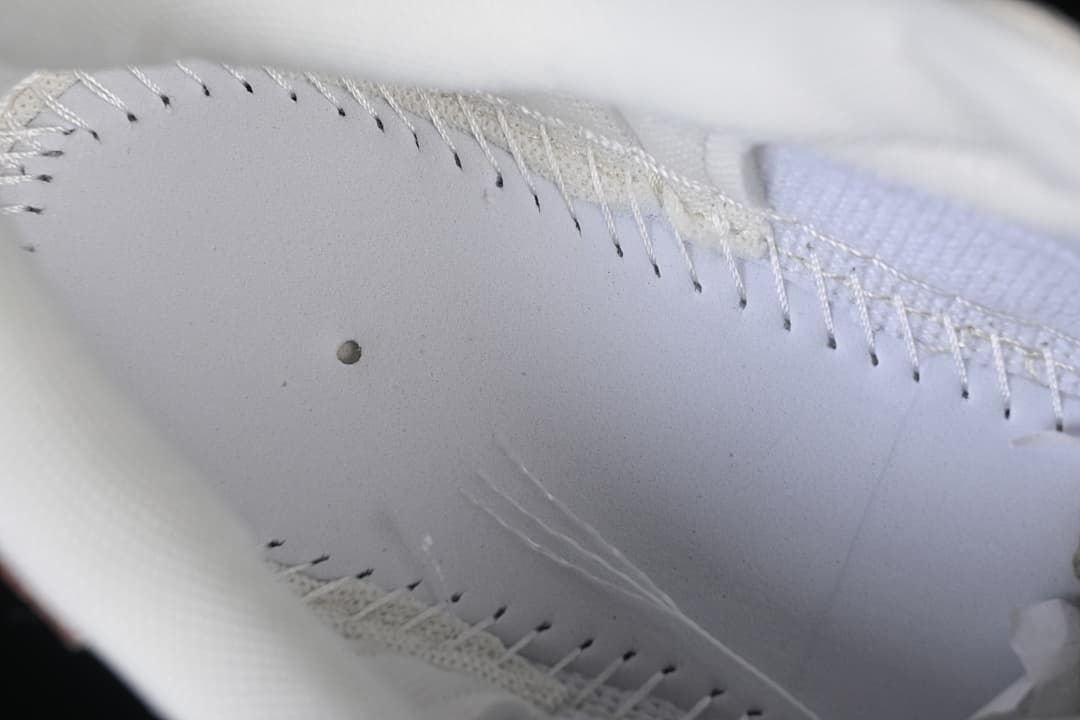 Close-up of the sneaker interior stitching and lining.