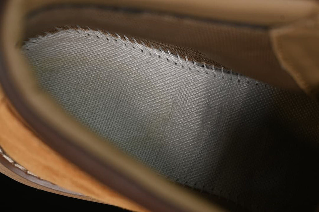 Close-up of the boot's interior stitching and lining